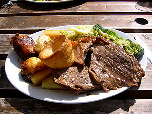A Sunday roast consisting of roast beef, roast...