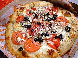 Greek pizza - kalamata olives, feta cheese, to...