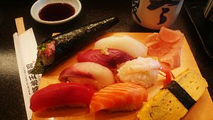 Many types of sushi ready to eat.