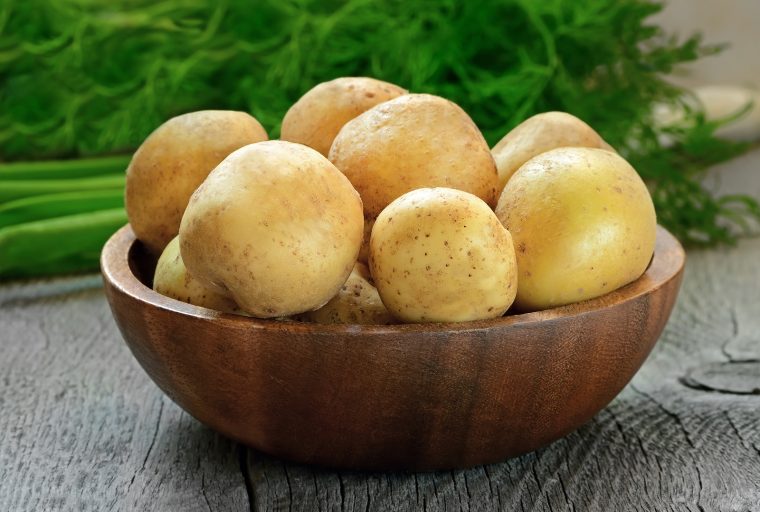 raw potatoes in bowl