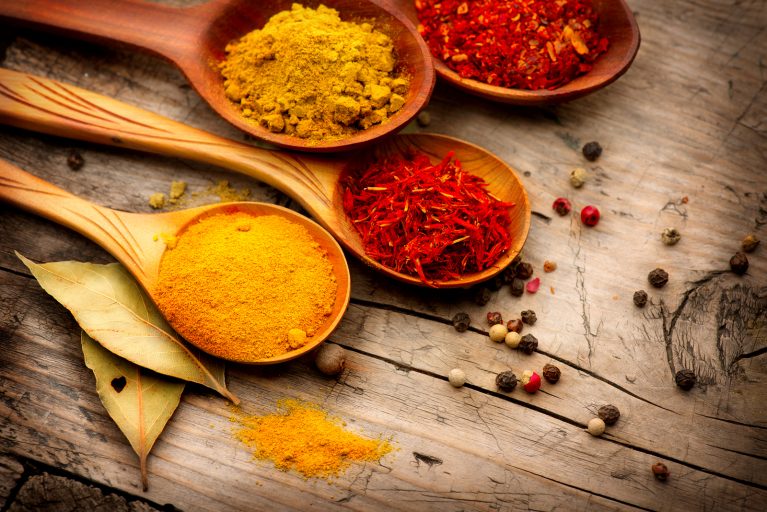 Spices. Spice over Wood. Herbs. Curry, Saffron, turmeric, cinnam