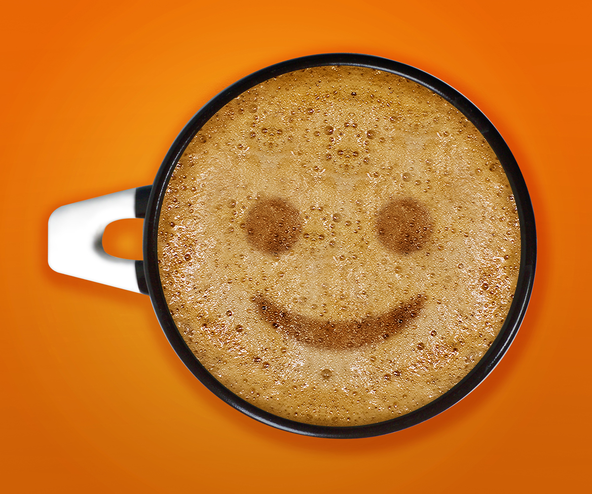 coffee art, A cup of cappuccino with smile face sign pattern in a cup on Orange background.