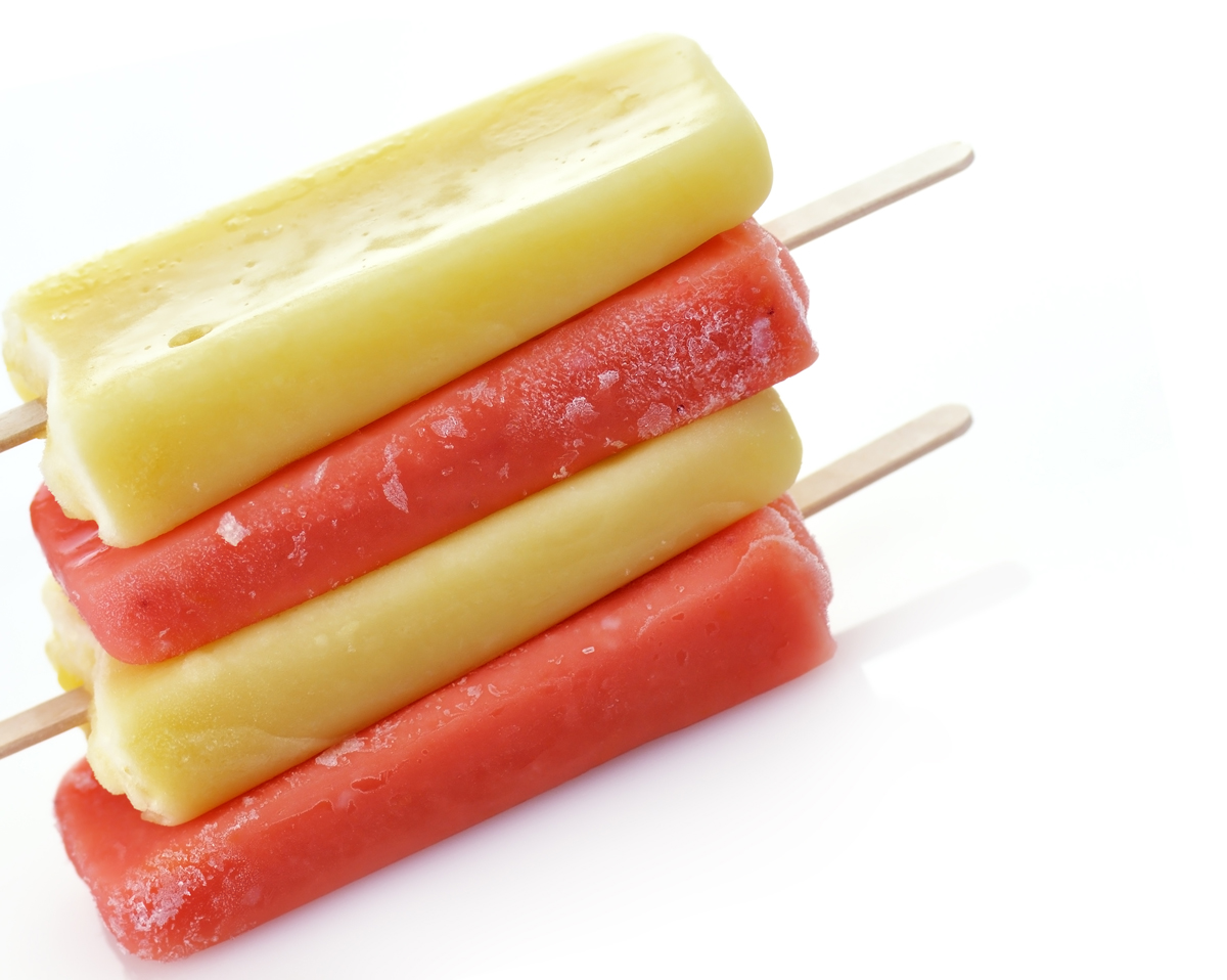 colorful ice cream pops on white background