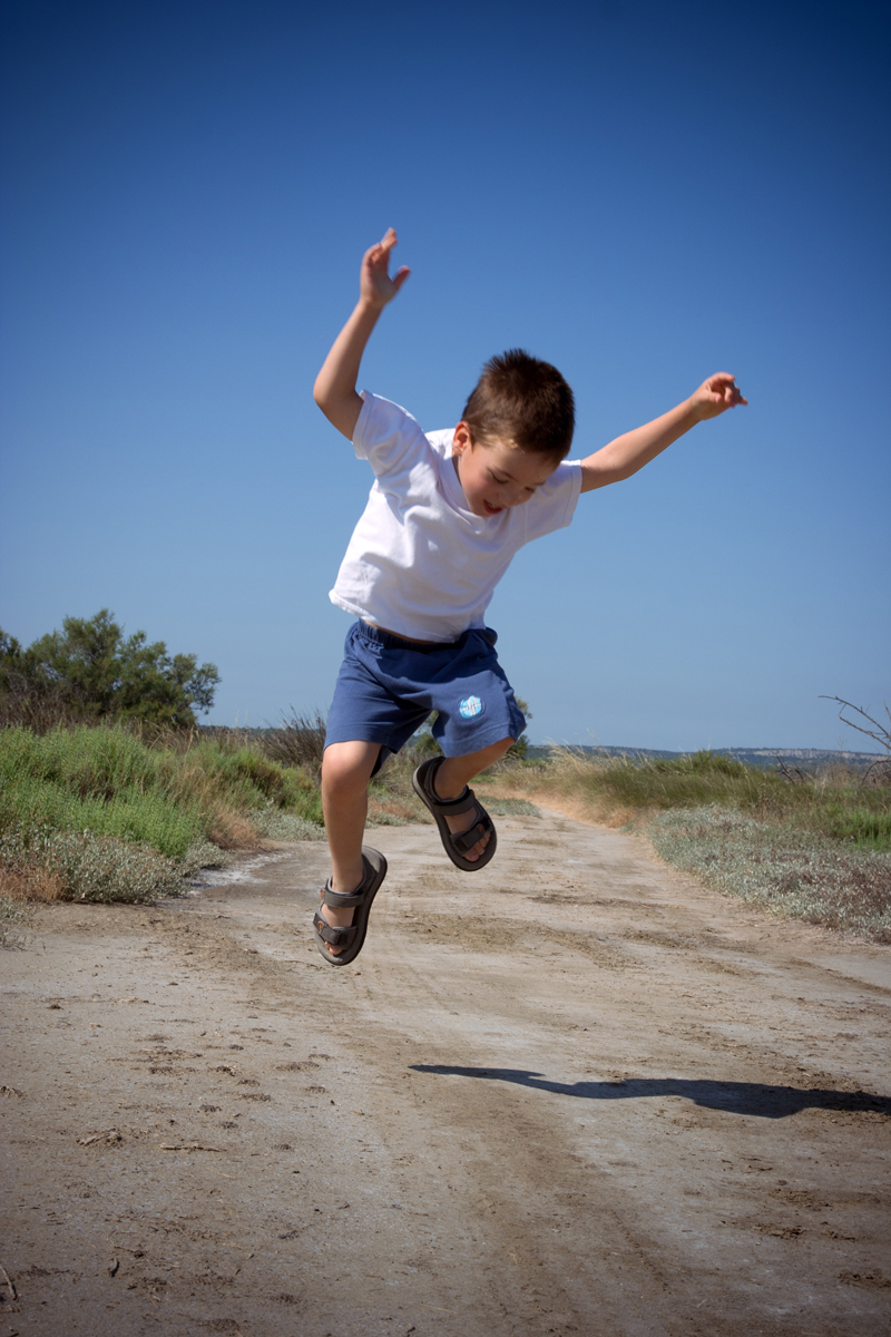 happy jumping child in summer